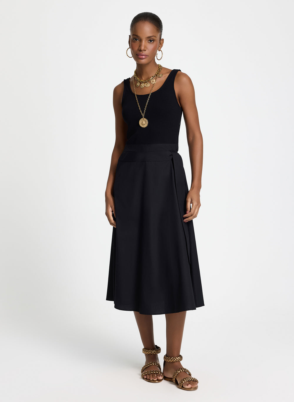 Vestido negro con bolsillos Tassi Le Lis Blanc